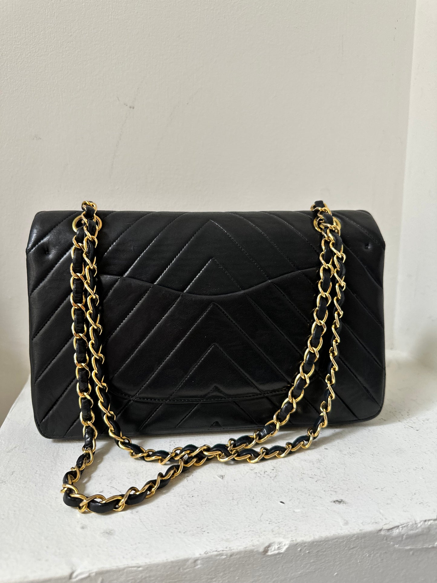 Chanel medium v-stitch flap bag