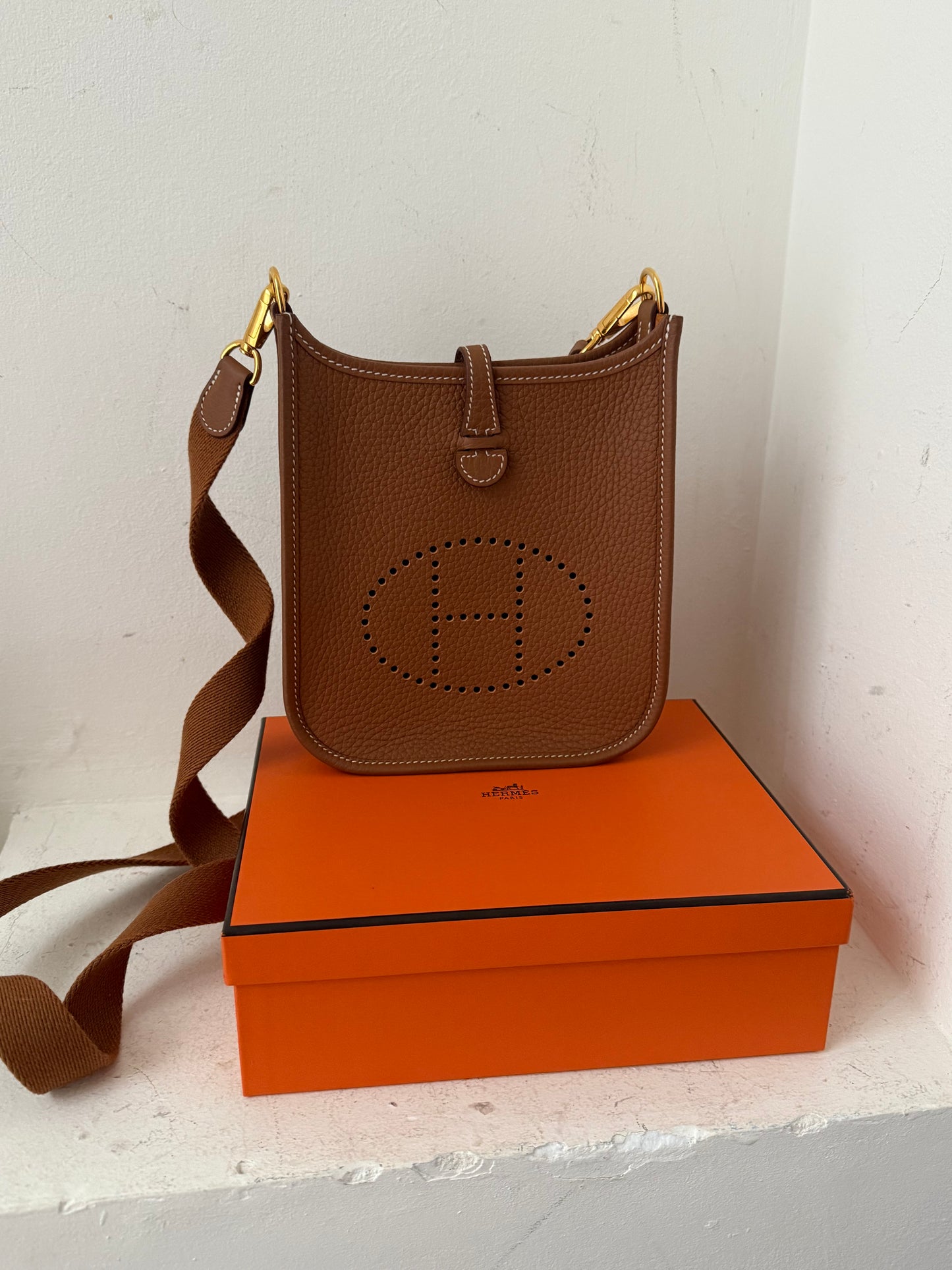 Hermes Evelyne mini in gold