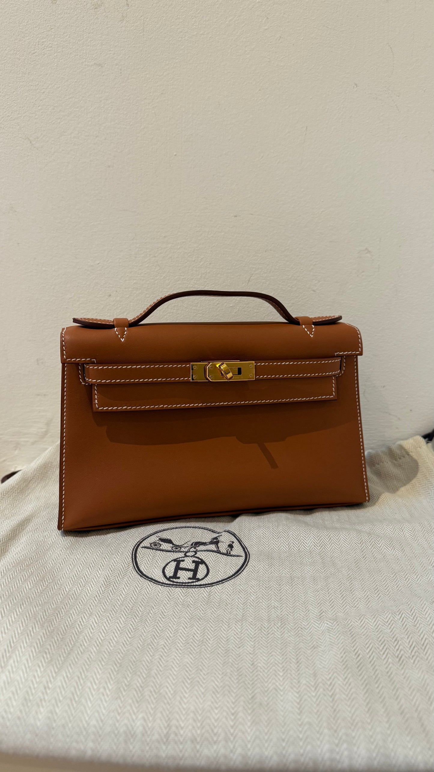Hermes kelly pochette gold Swift W stamp