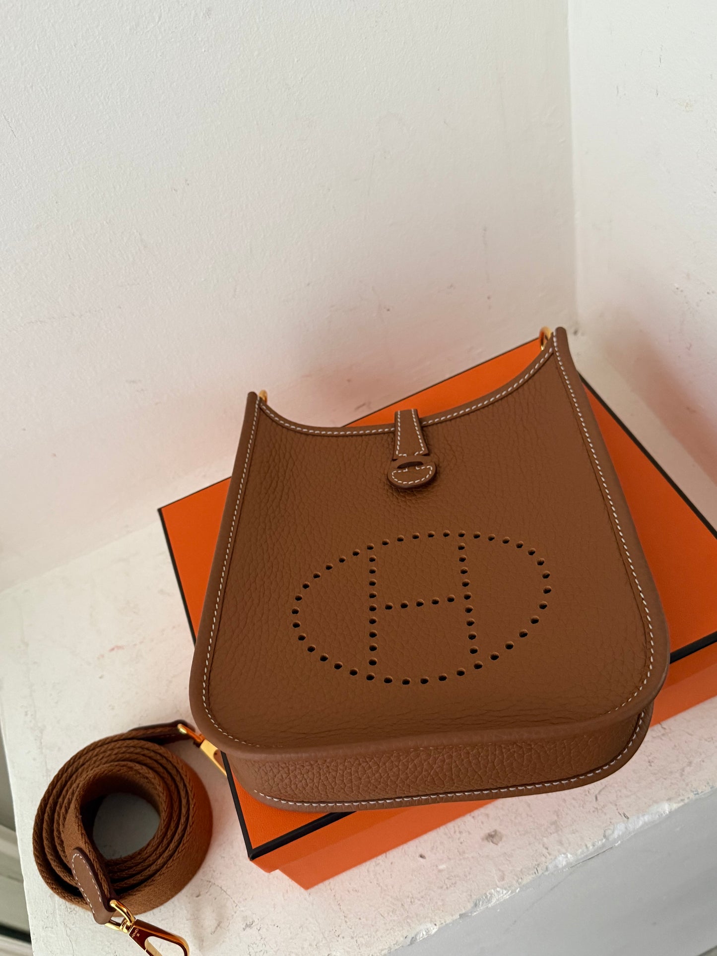 Hermes Evelyne mini in gold