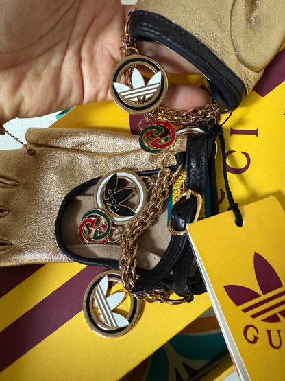 Gucci X Adidas gold gloves