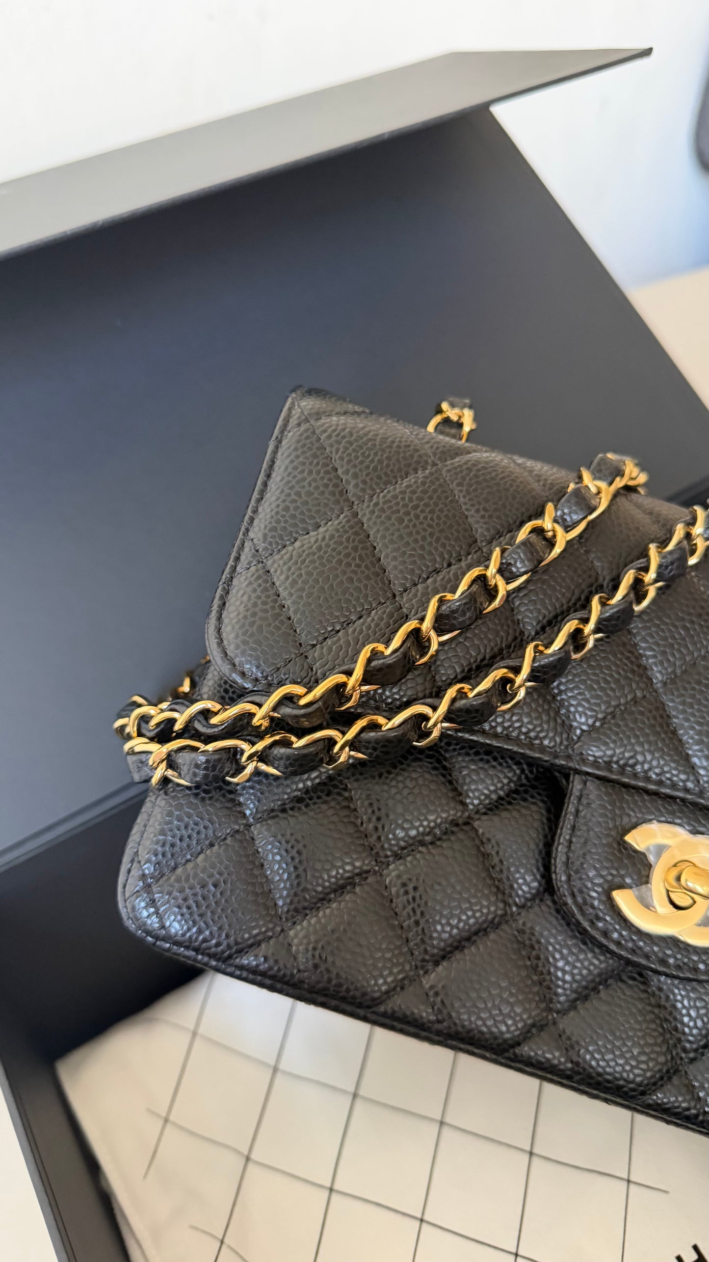 Chanel small classic flap black caviar with chip