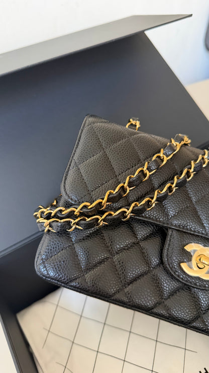 Chanel small classic flap black caviar with chip