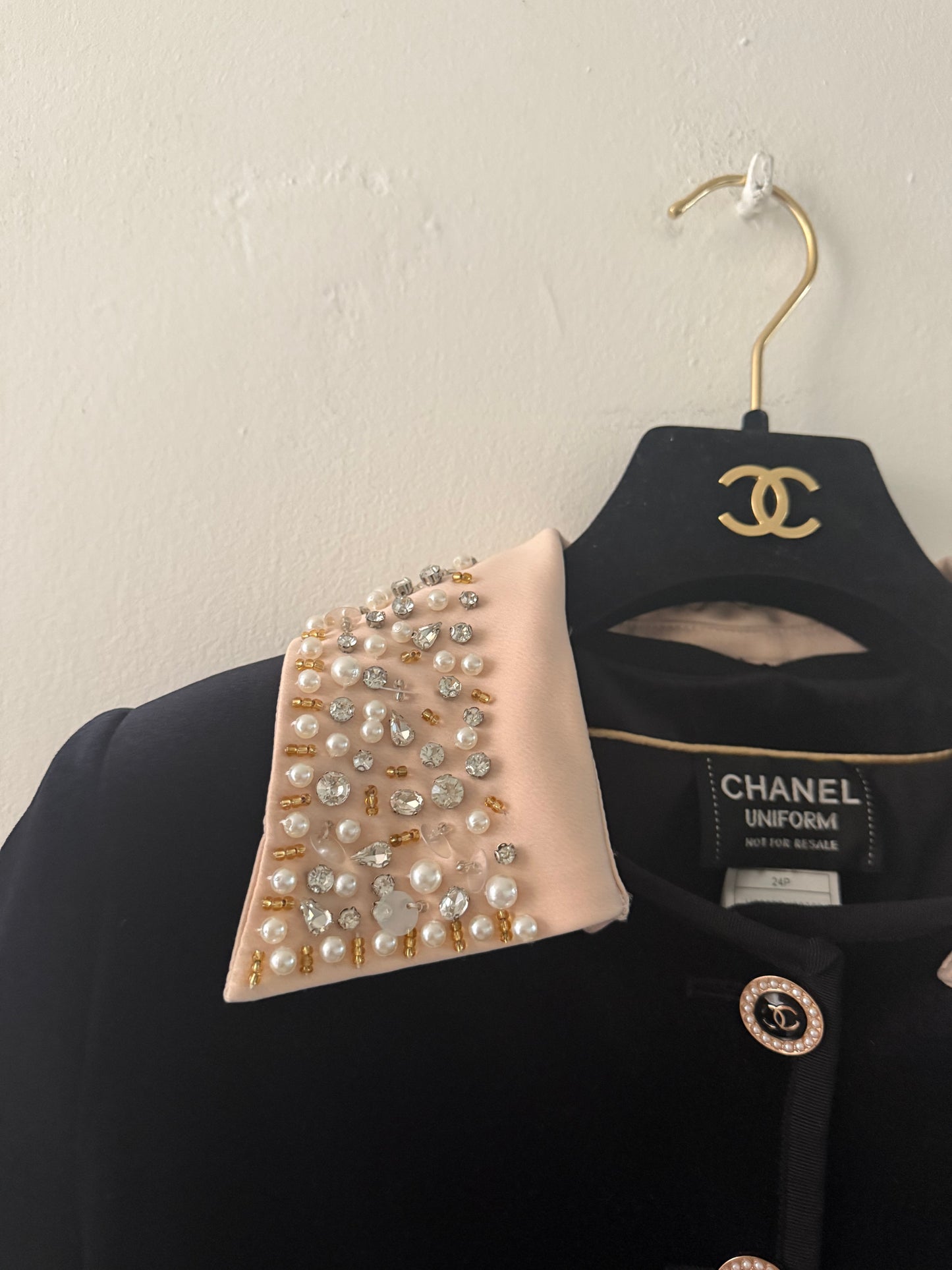 Chanel uniform jacket with embellishments