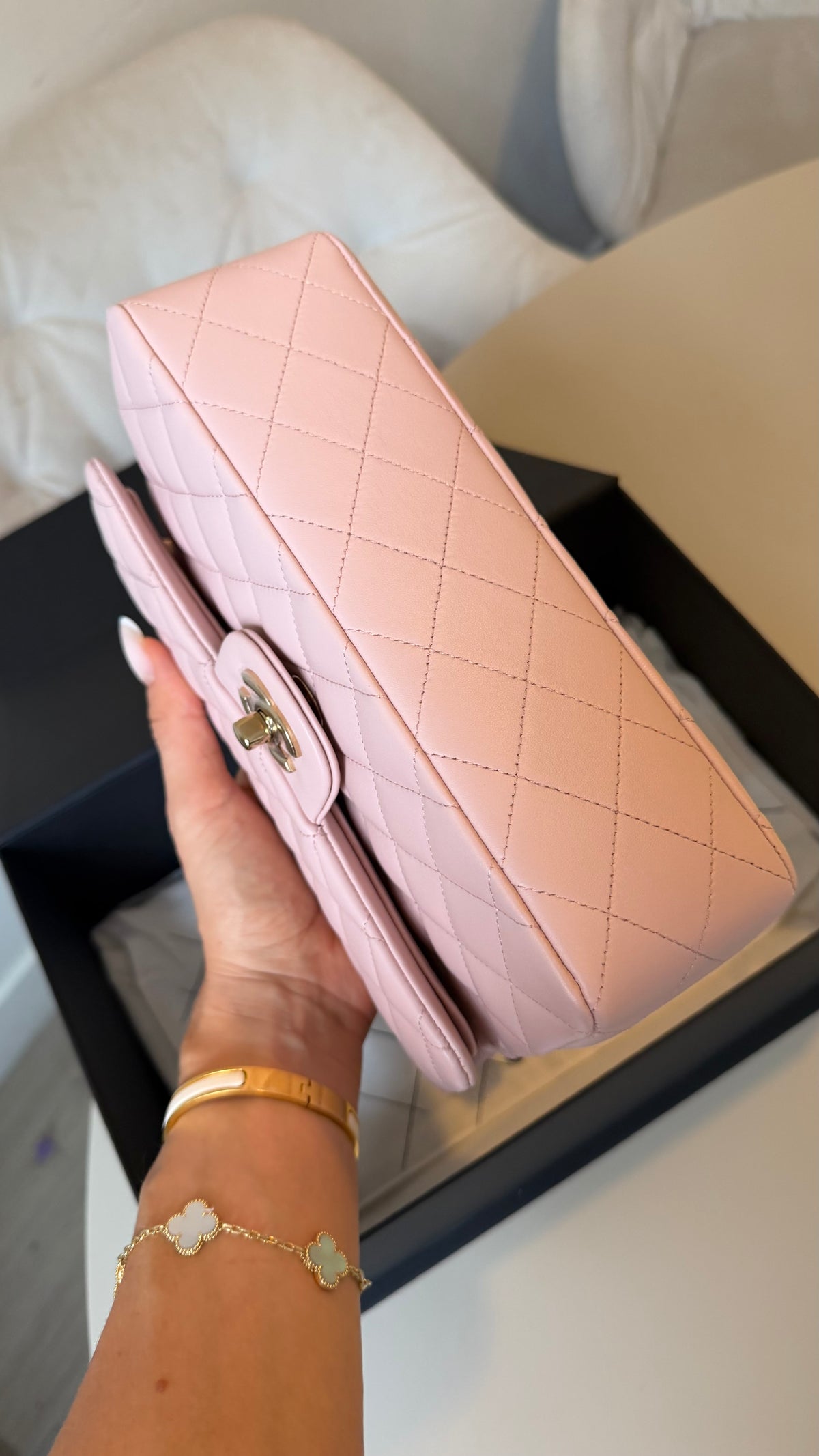 Small lambskin classic flap Chanel in baby pink with chip