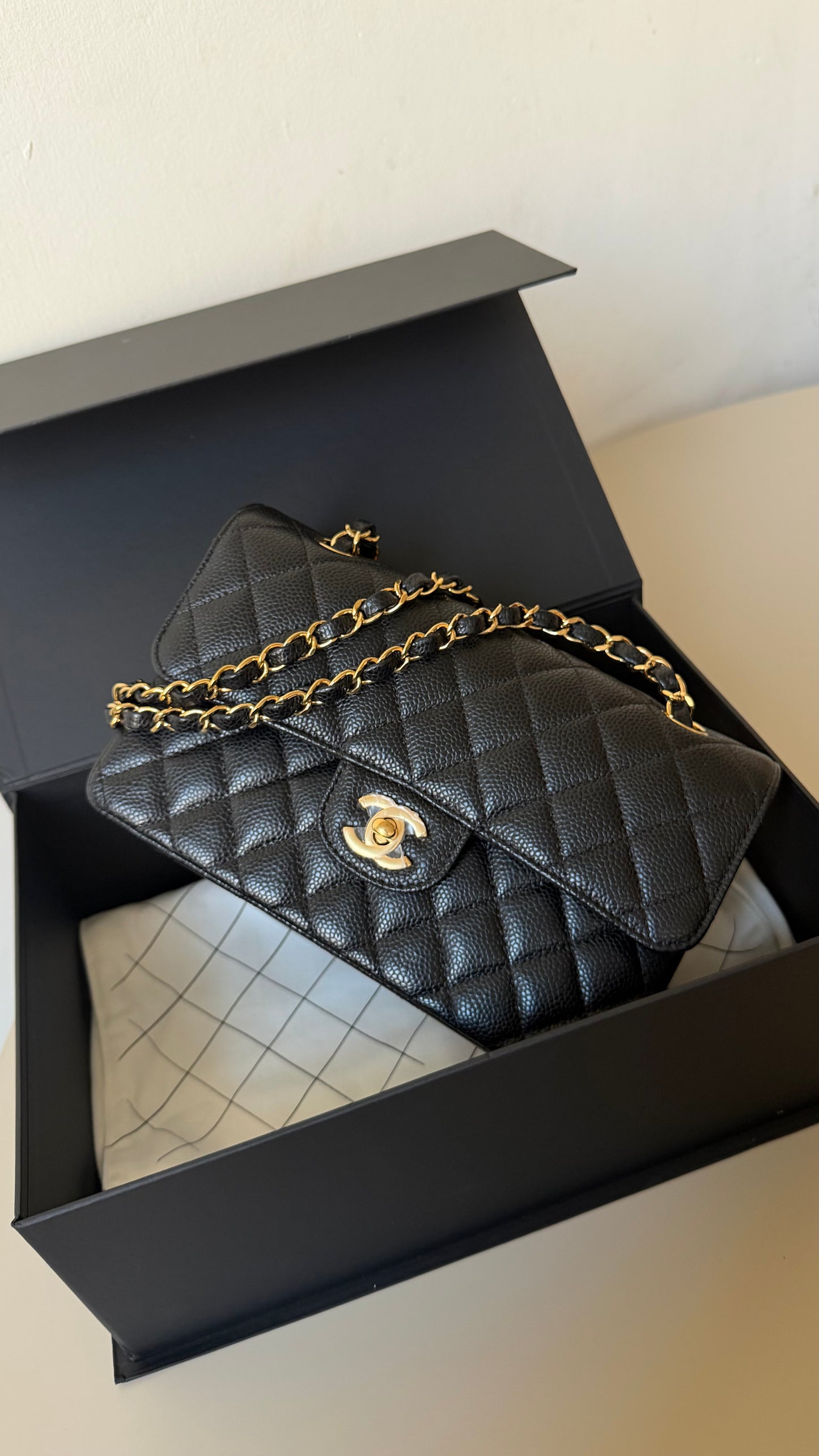 Chanel small classic flap black caviar with chip