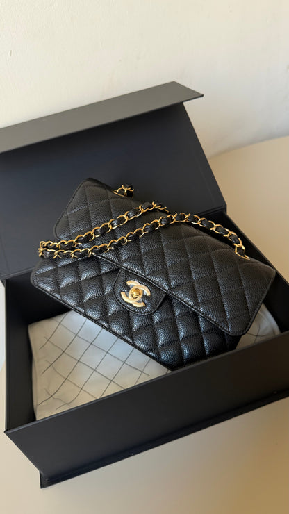 Chanel small classic flap black caviar with chip