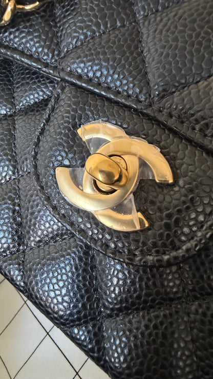 Chanel small classic flap black caviar with chip