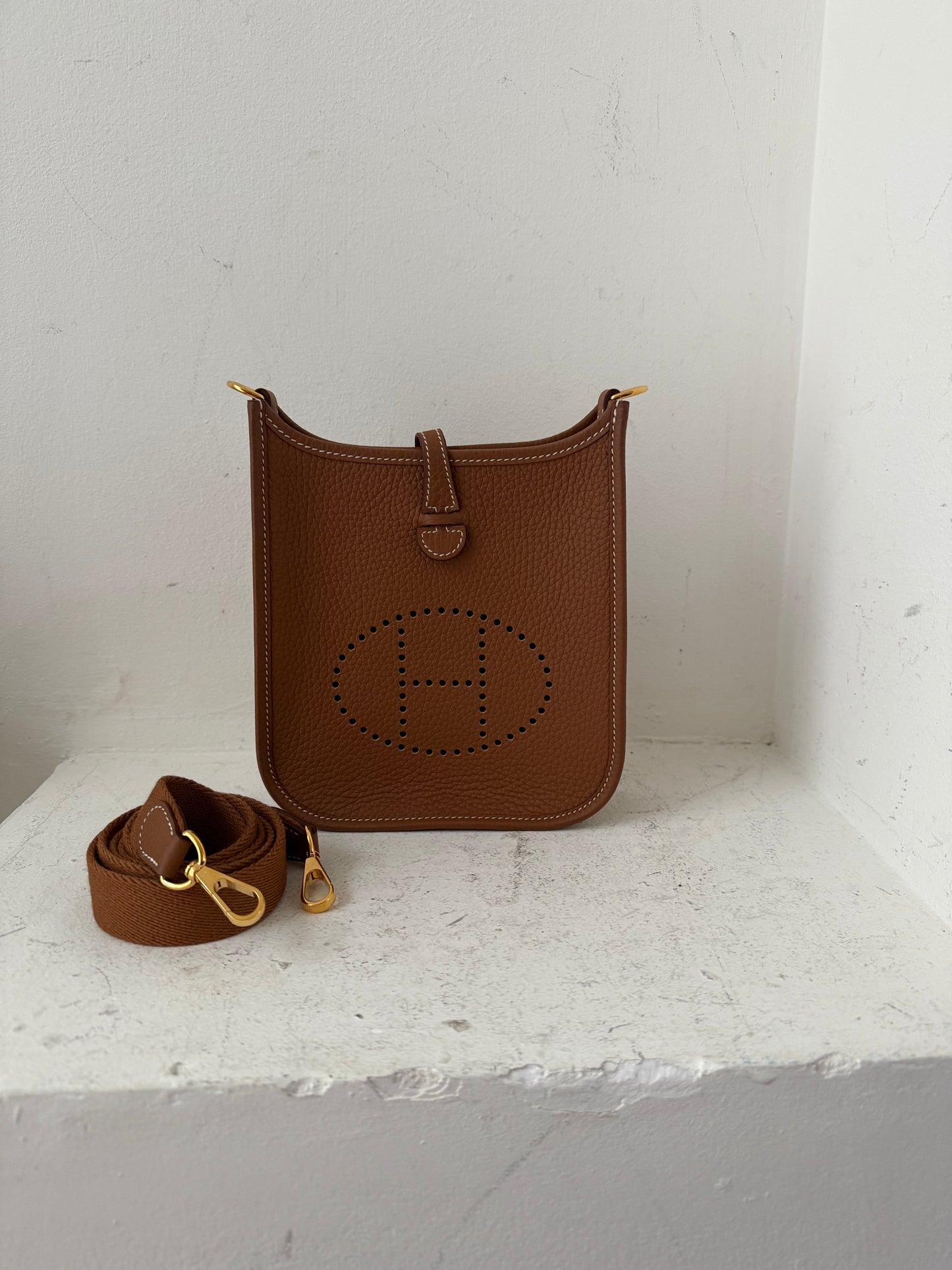 Hermes Evelyne mini in gold