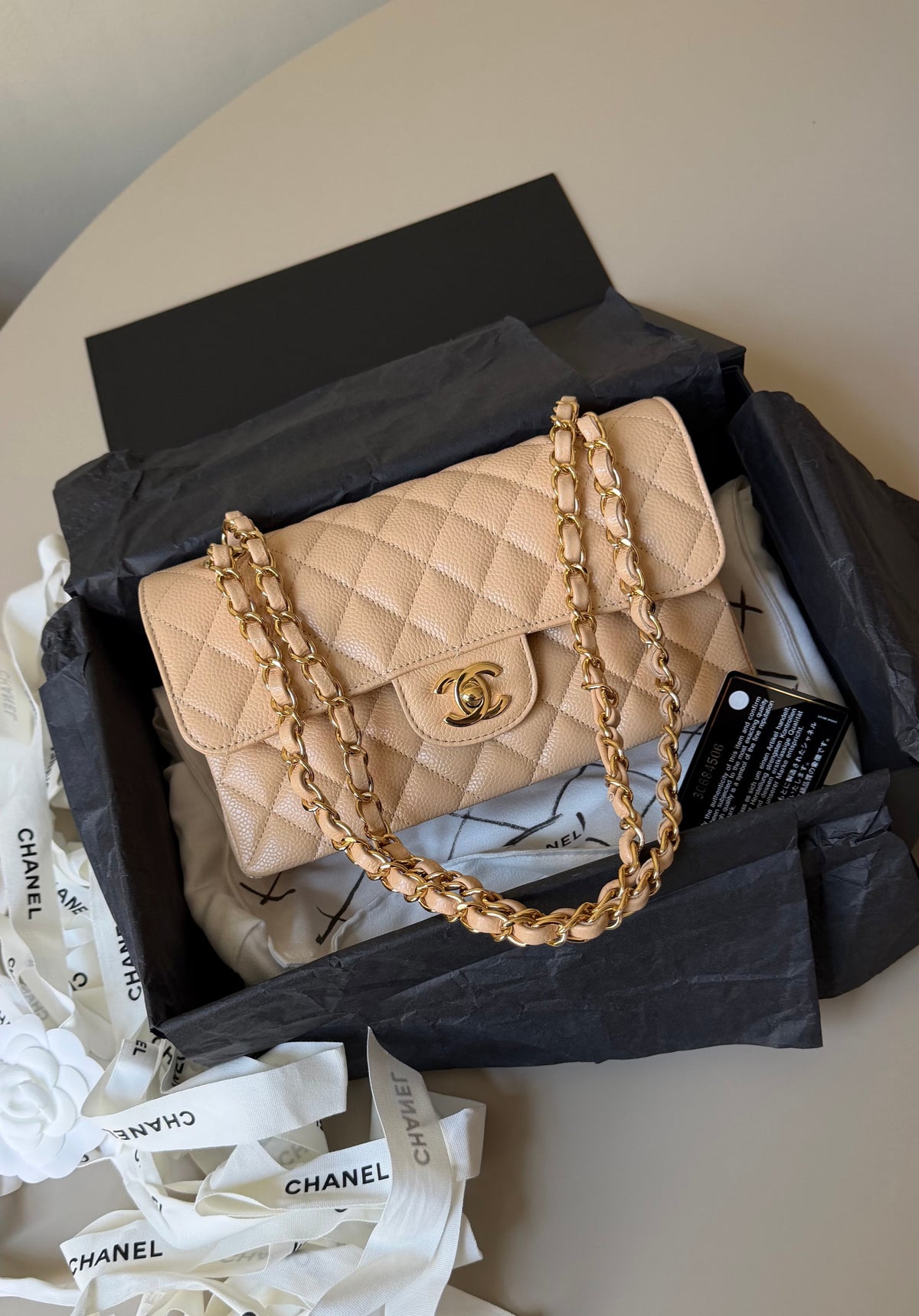 Chanel small classic flapbag caviar beige