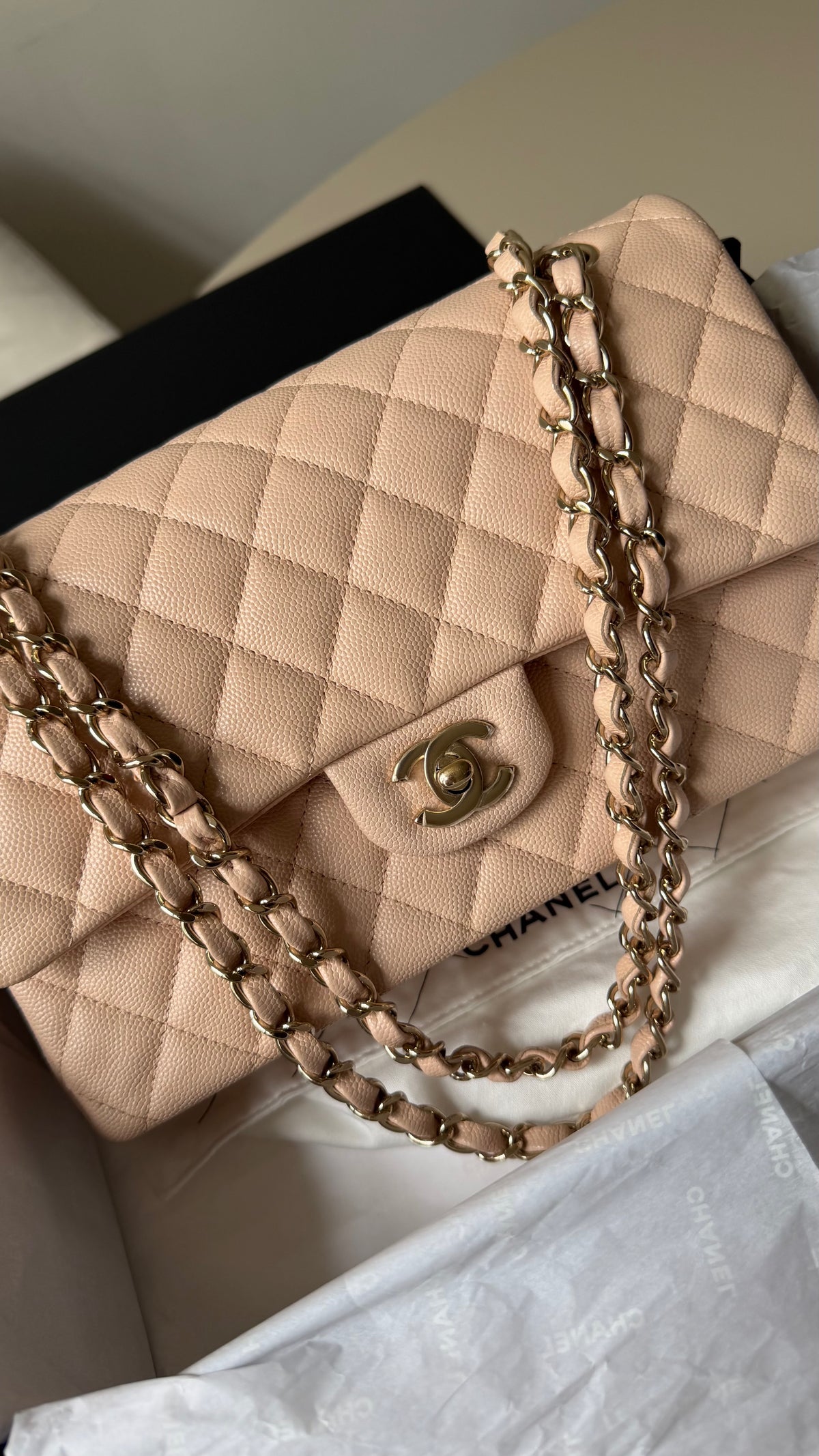 Chanel medium caviar cream beige flapbag with chip (2022-2026)