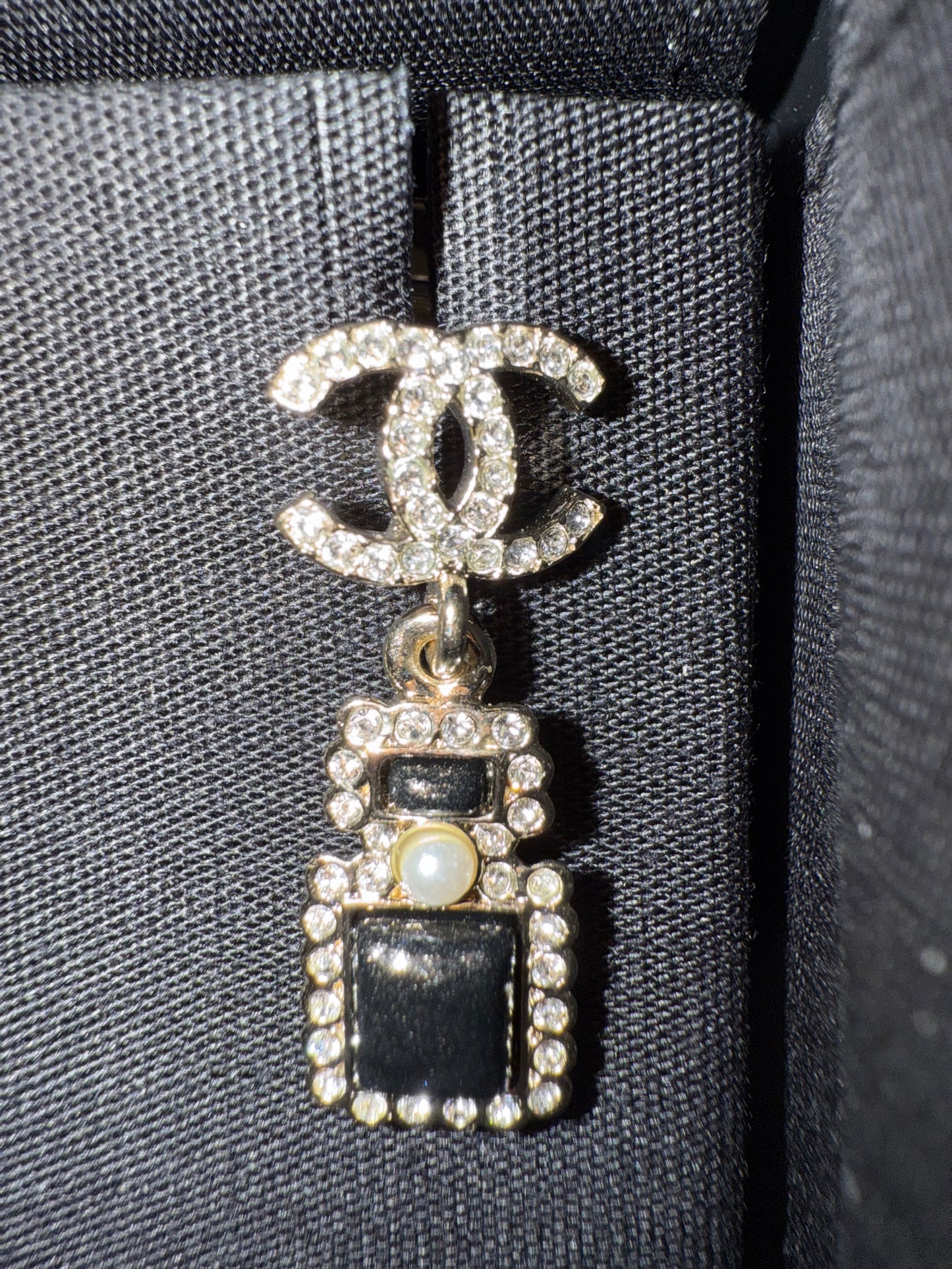 Chanel earrings CC perfume bottle