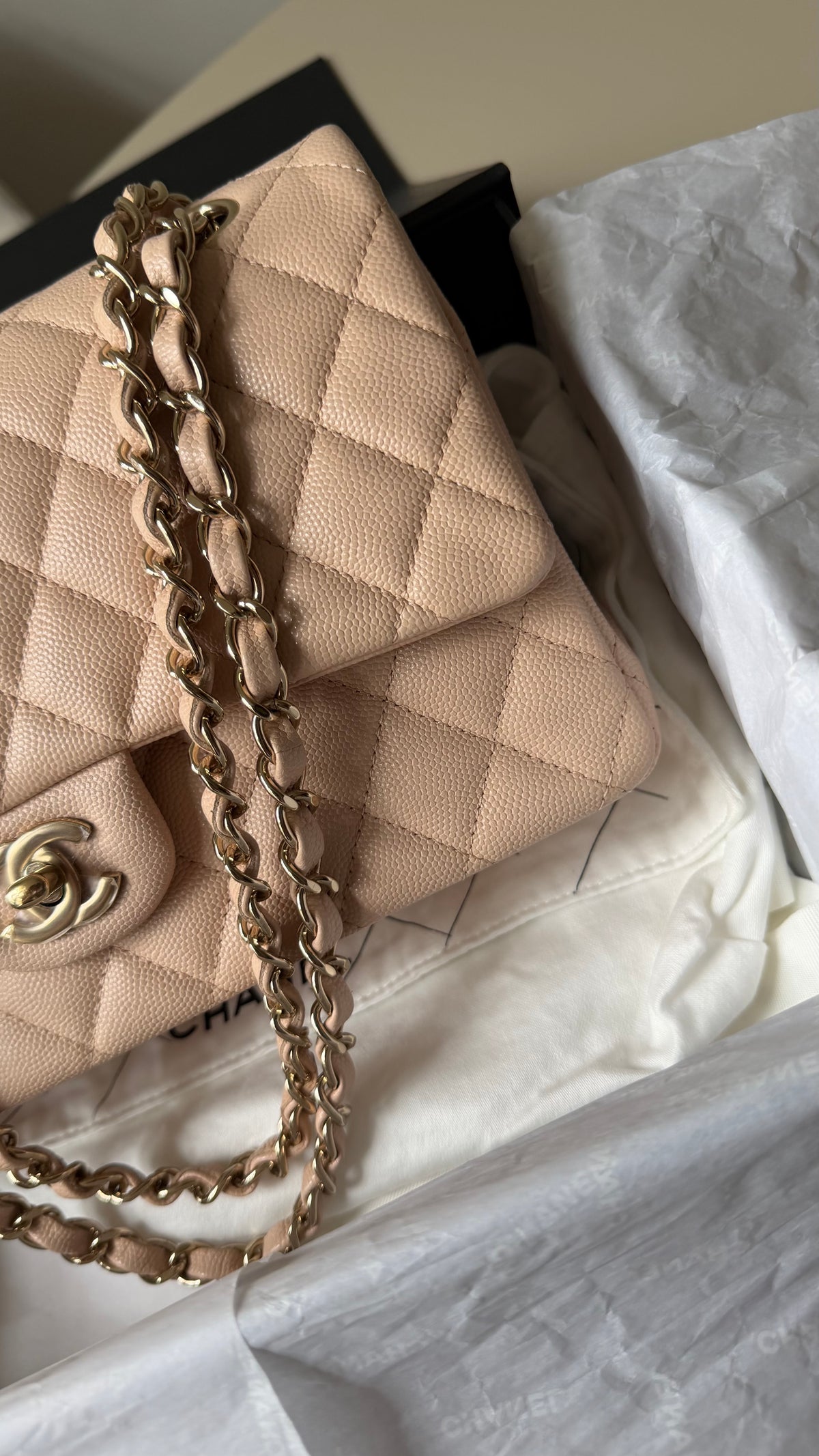 Chanel medium caviar cream beige flapbag with chip (2022-2026)