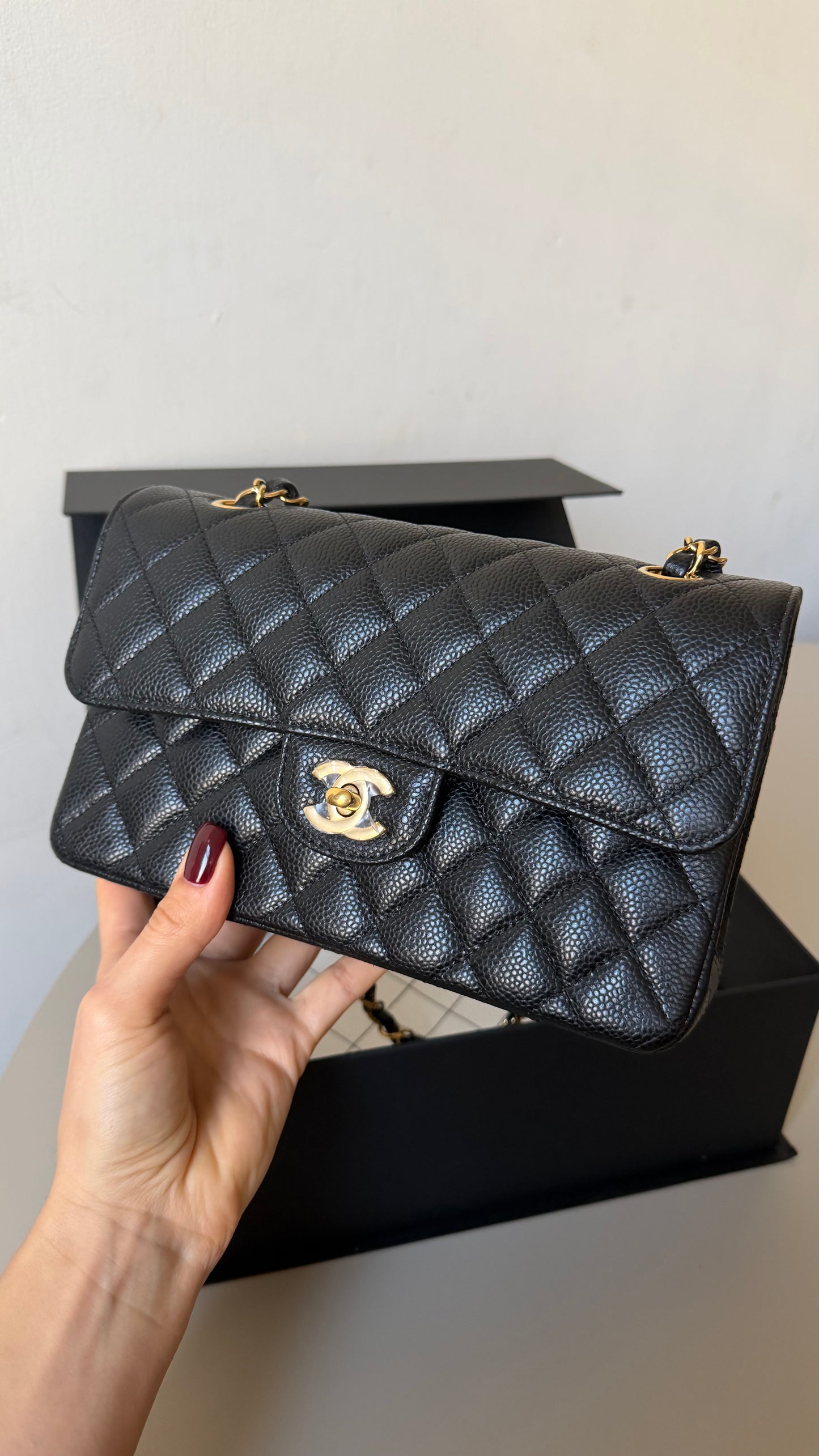Chanel small classic flap black caviar with chip