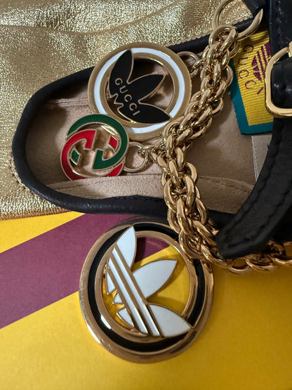 Gucci X Adidas gold gloves