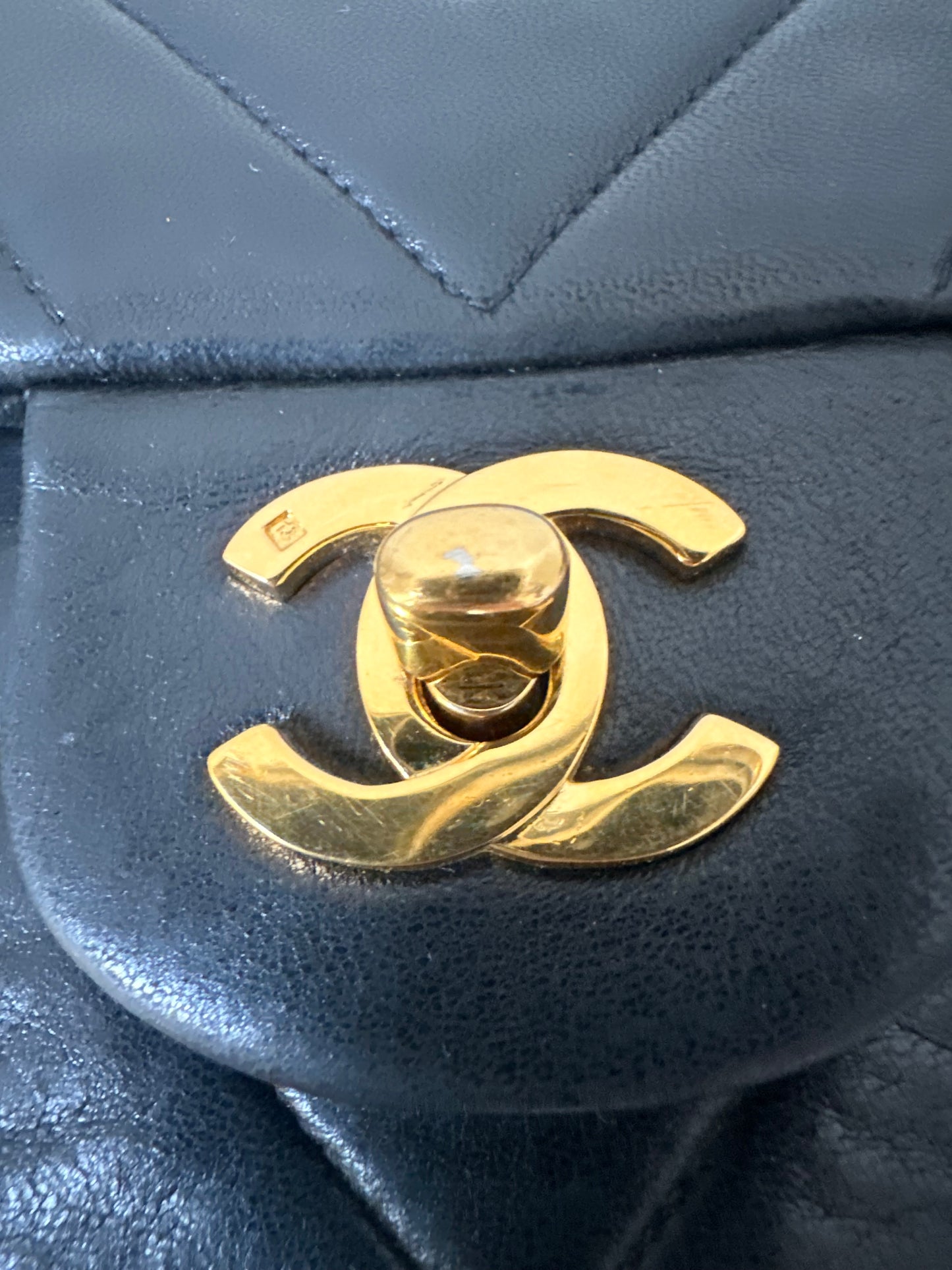 Chanel medium v-stitch flap bag