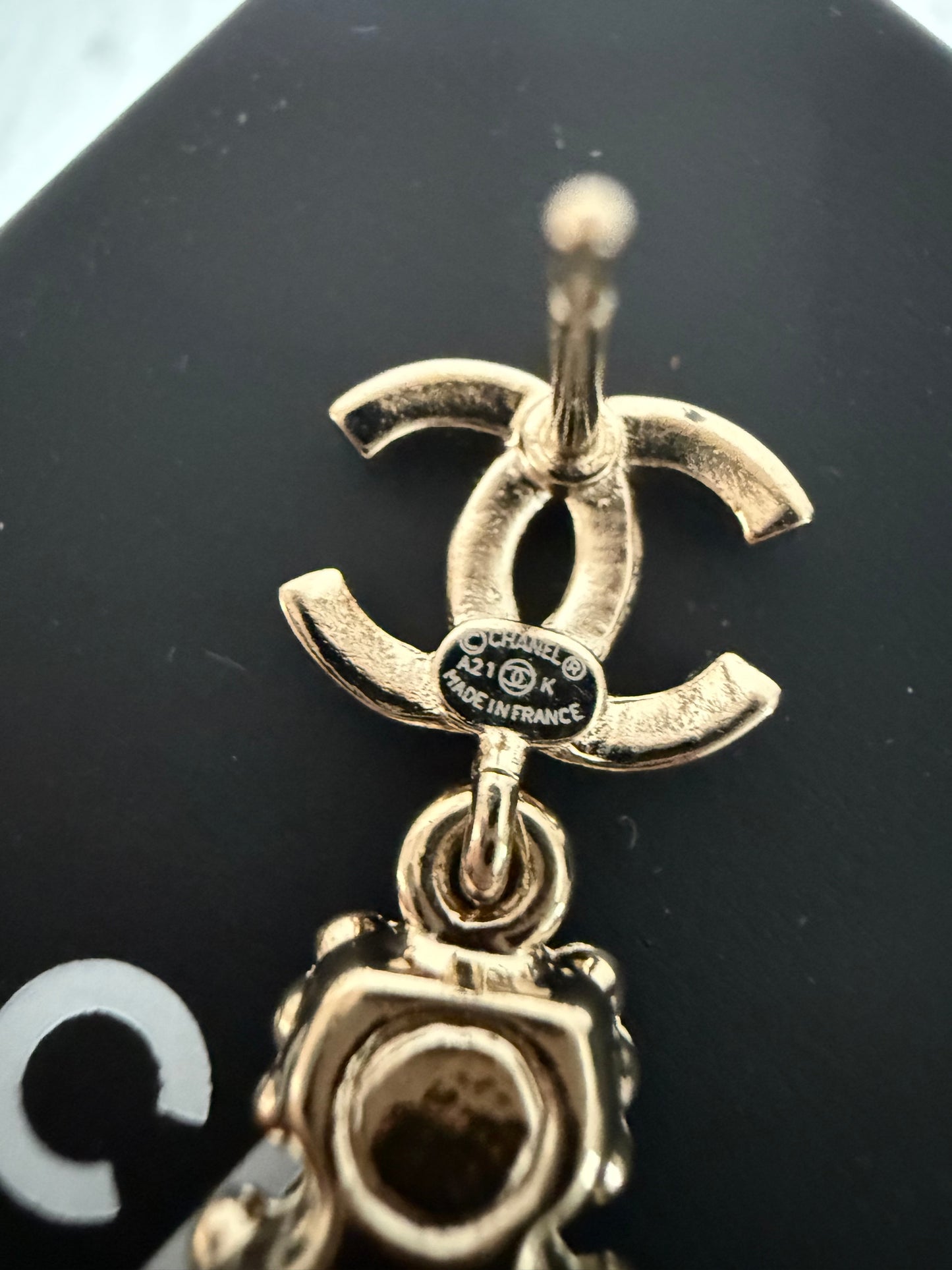 Chanel earrings CC perfume bottle