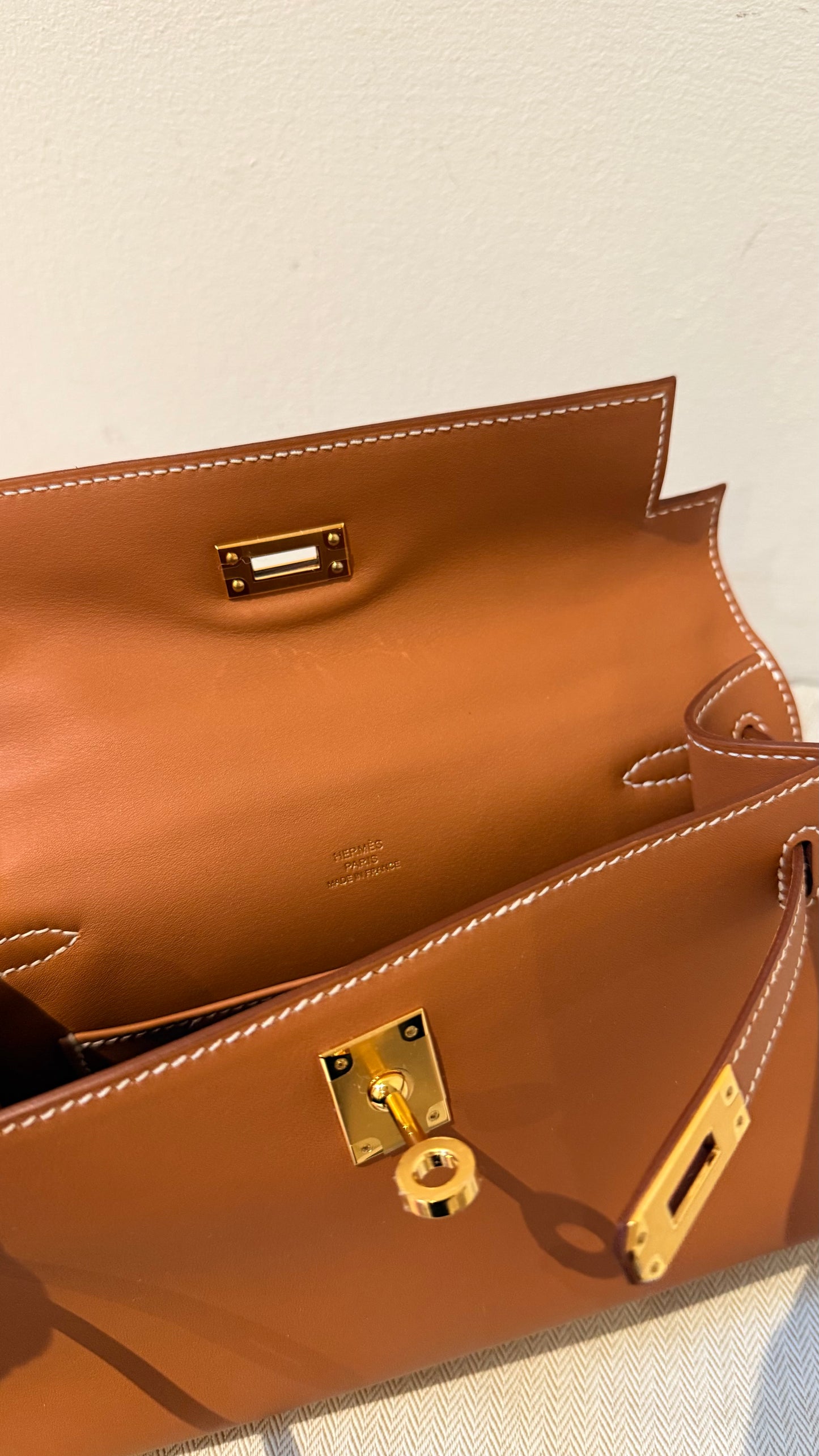 Hermes kelly pochette gold Swift W stamp