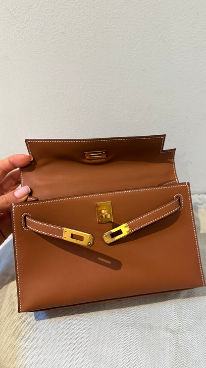 Hermes kelly pochette gold Swift W stamp