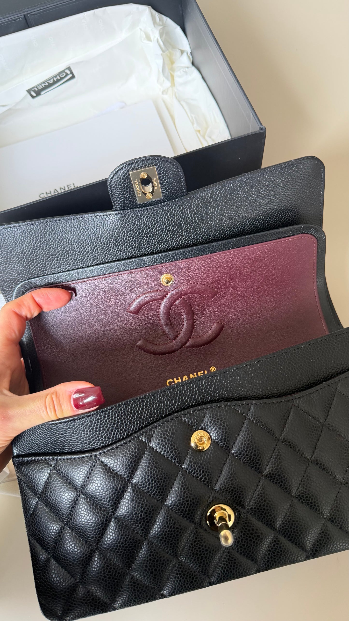 Chanel medium caviar double flapbag with chip