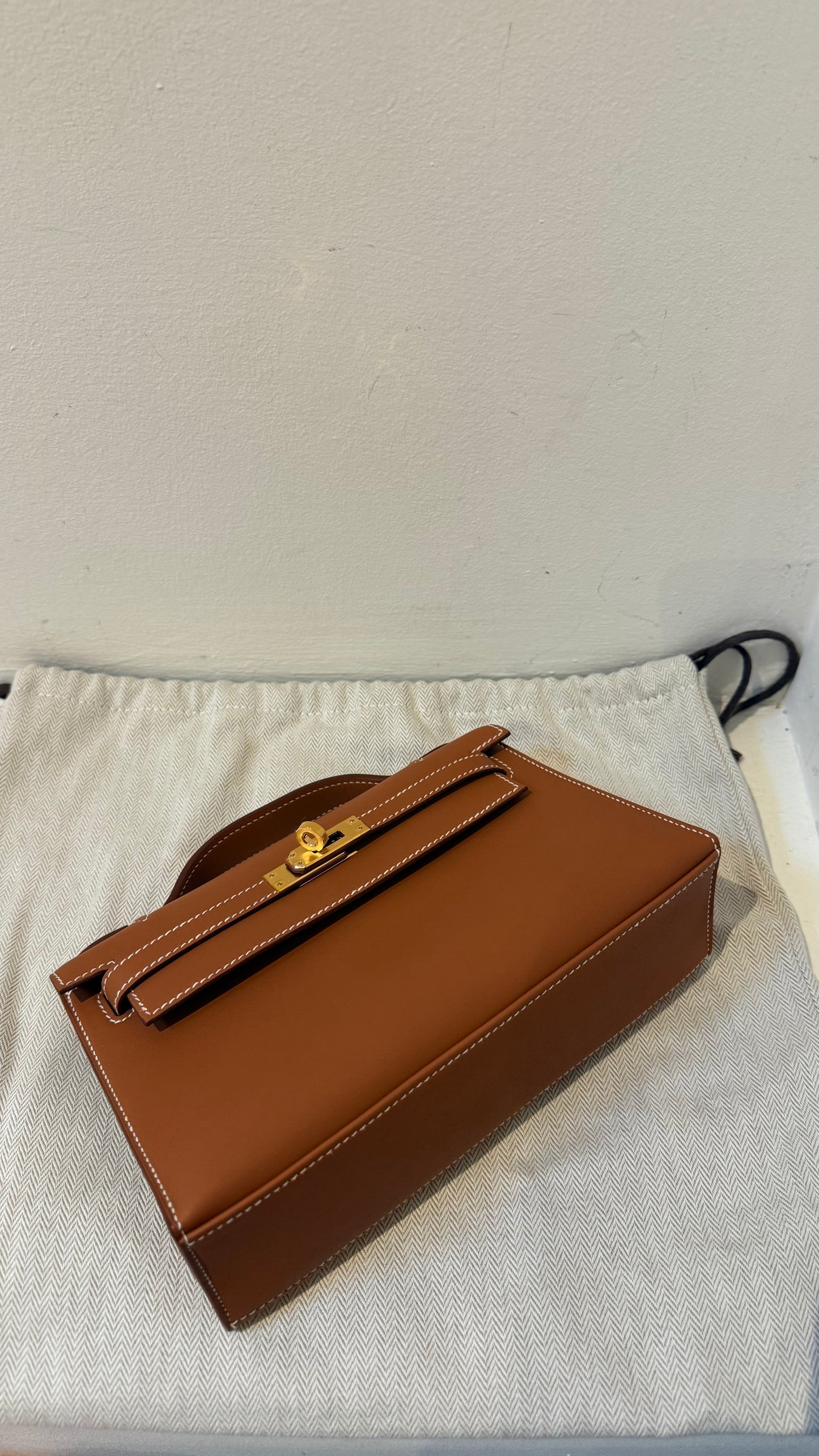 Hermes kelly pochette gold Swift W stamp