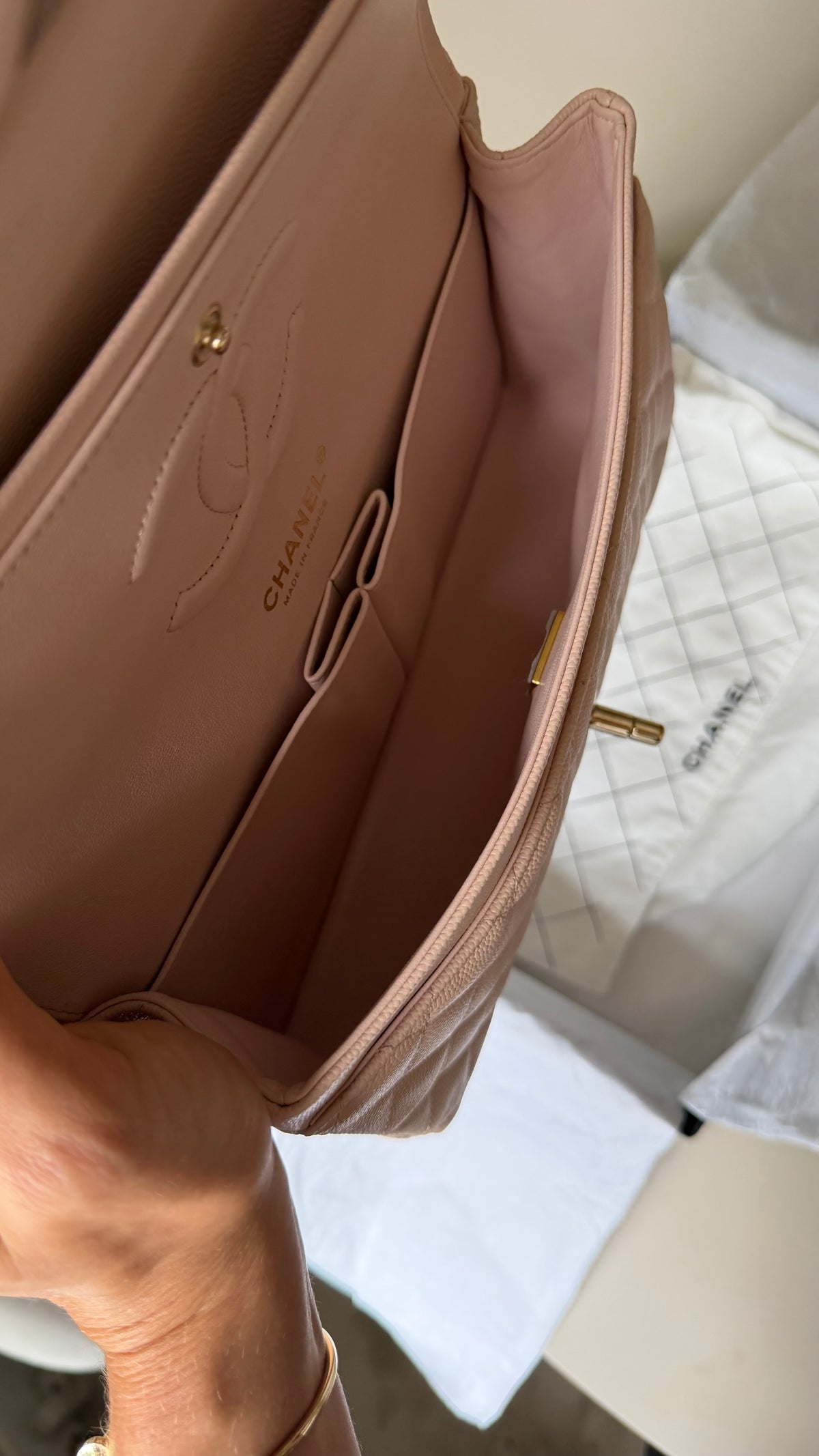 Chanel medium caviar cream beige flapbag with chip (2022-2026)