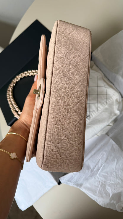 Chanel medium caviar cream beige flapbag with chip (2022-2026)
