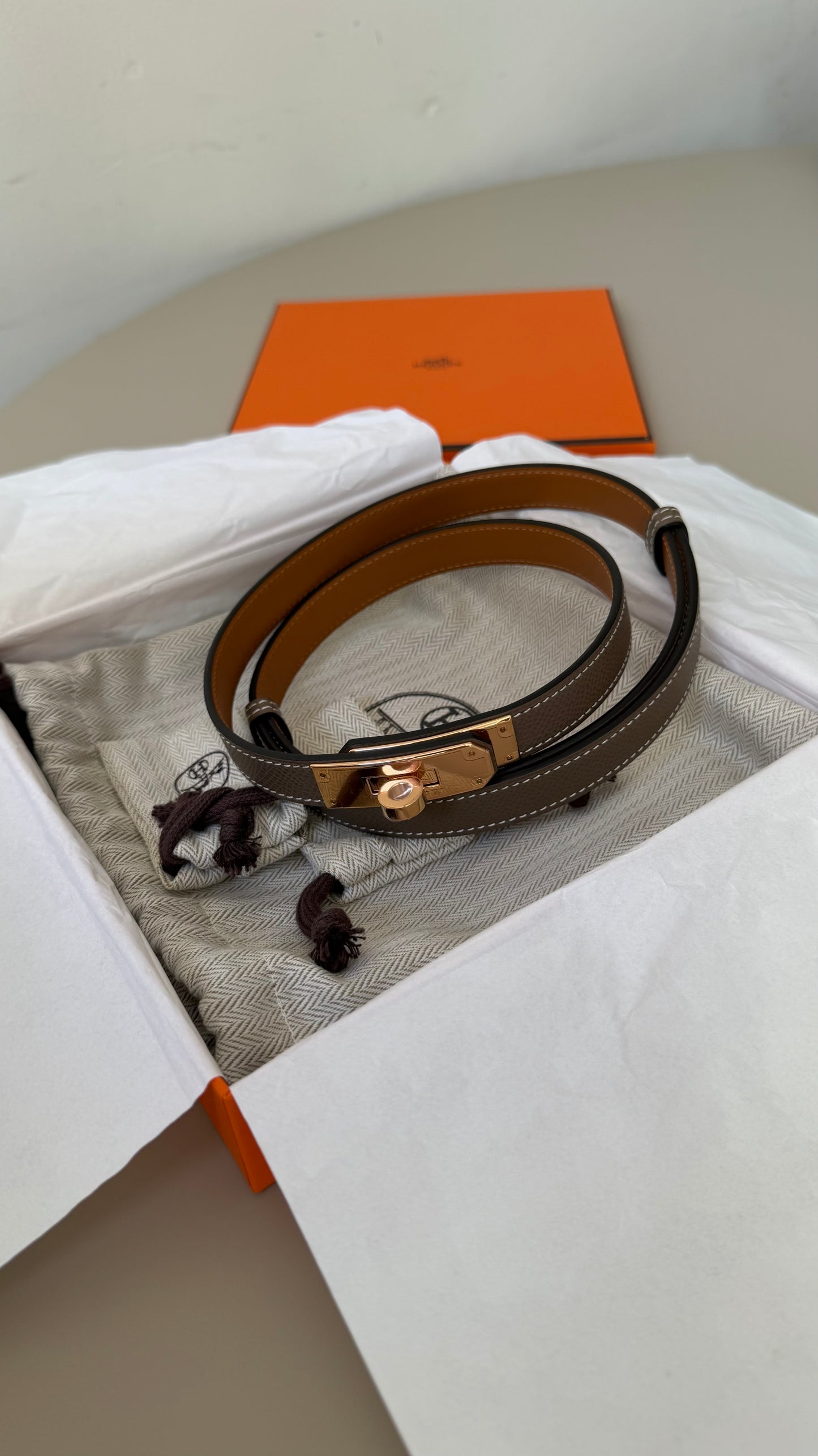 Hermes Kelly belt etoupe with rose gold hardware