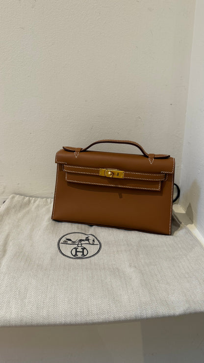 Hermes kelly pochette gold Swift W stamp