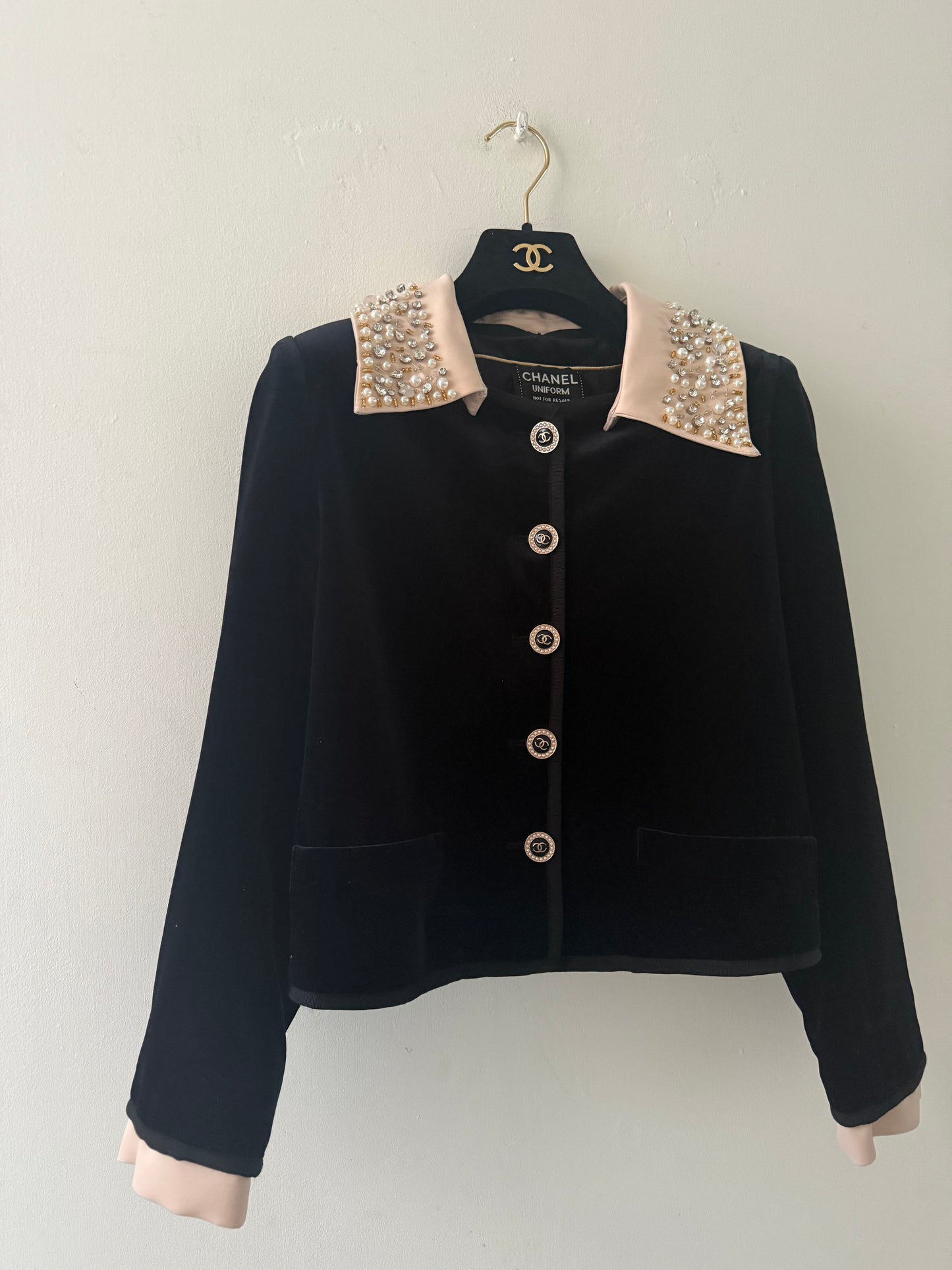 Chanel uniform jacket with embellishments